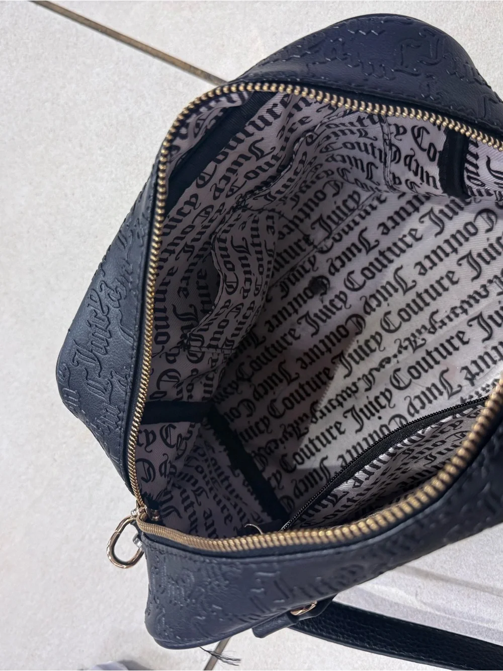 Juicy Couture Black Embossed Satchel with Gold Plate